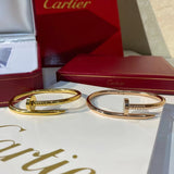 Close-up detail view of Cartier unisex jewelry piece