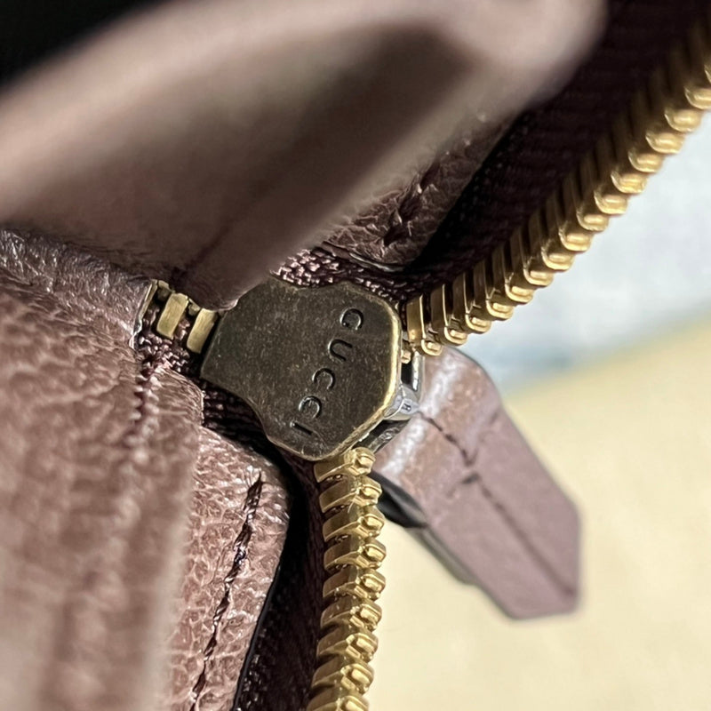 Handle and strap detail of statement elevated women's handbag – women's statement bag