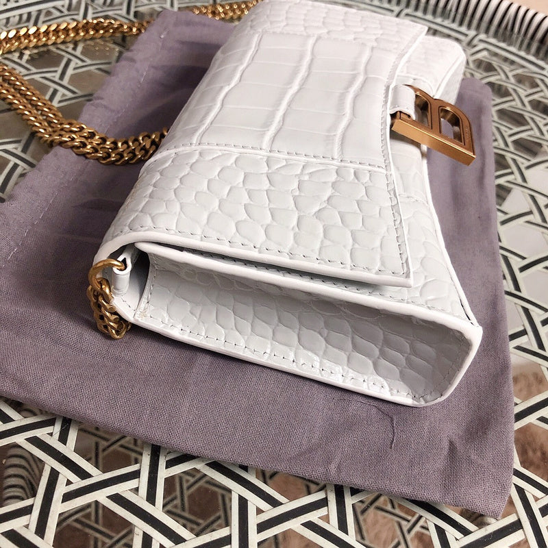 Back view of chic polished women's handbag – women's statement bag