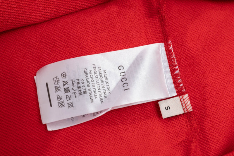 Close-up detail shot of Gucci luxury clothing with streetwear-inspired cut