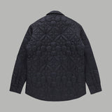 Side profile of Louis Vuitton luxury clothing with monogram-inspired silhouette