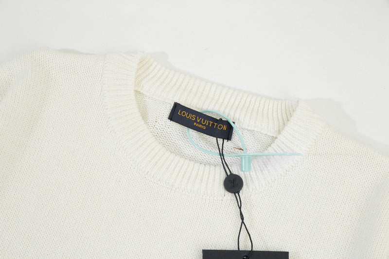 Flat lay presentation of Louis Vuitton luxury clothing with relaxed-fit cut