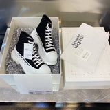 Alexander McQueen White Chunky Platform Sneakers - Full Silhouette View
