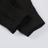 Close-up detail shot of Louis Vuitton luxury clothing with monogram-inspired silhouette