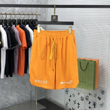 Front view of Rhude luxury clothing with label-forward styling
