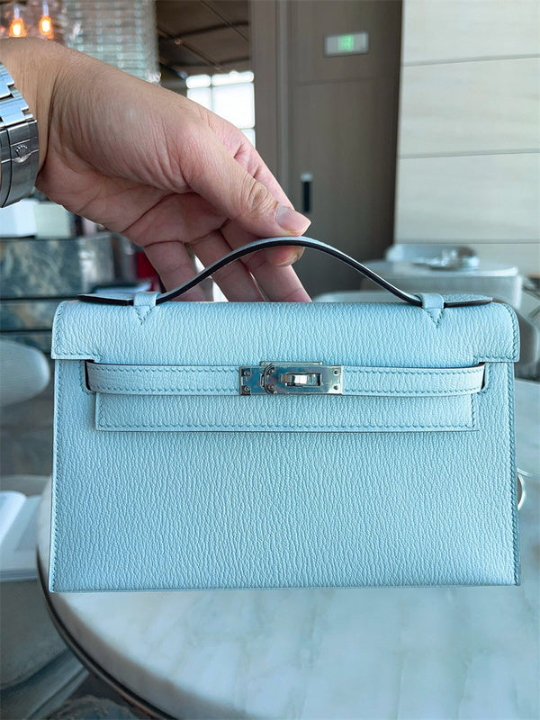  Signature carryall bag carried on shoulder