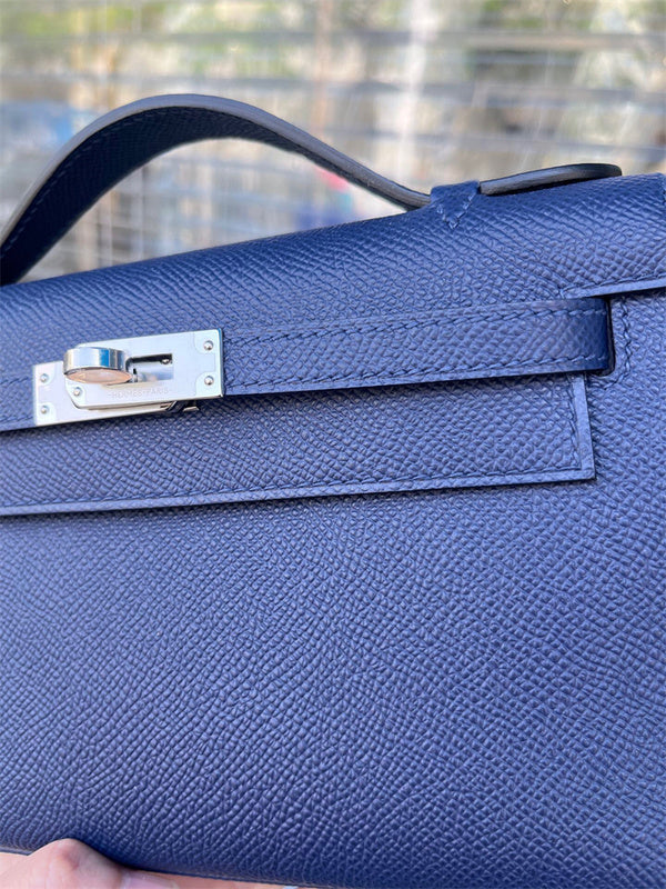 Side view of modernist structured handbag