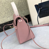 Side profile of modern polished women's handbag – women's luxury accessory