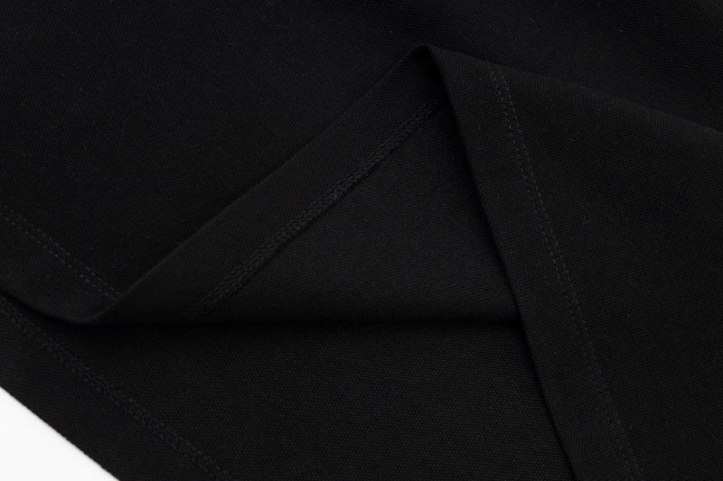 Side profile of Polo cotton polo shirt with monogram-inspired silhouette