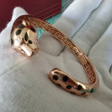 Side view of Cartier unisex jewelry piece
