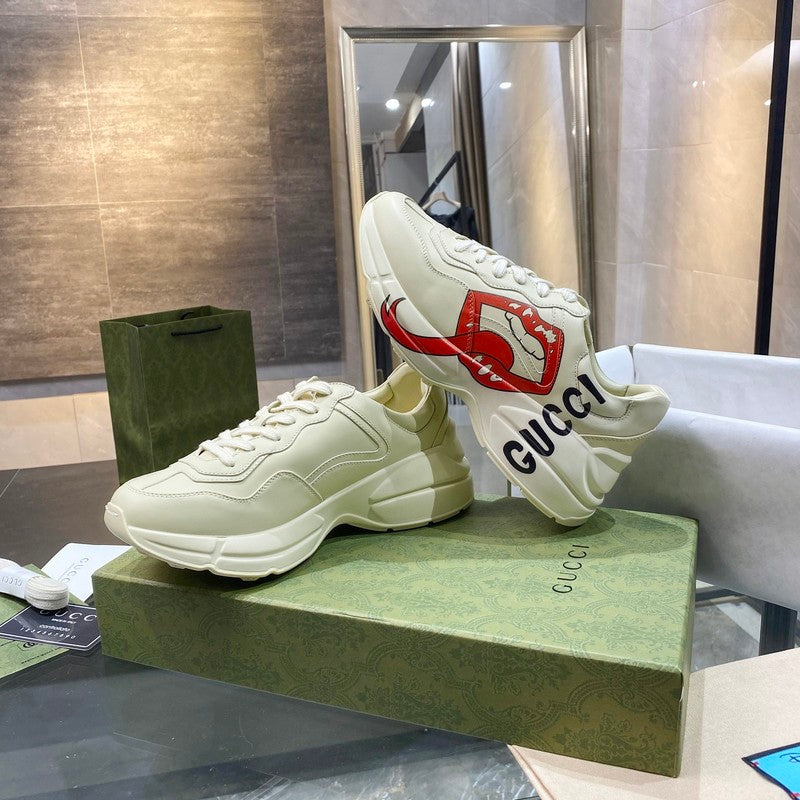 Gucci crisp white luxury sneakers view 9 retro runner design
