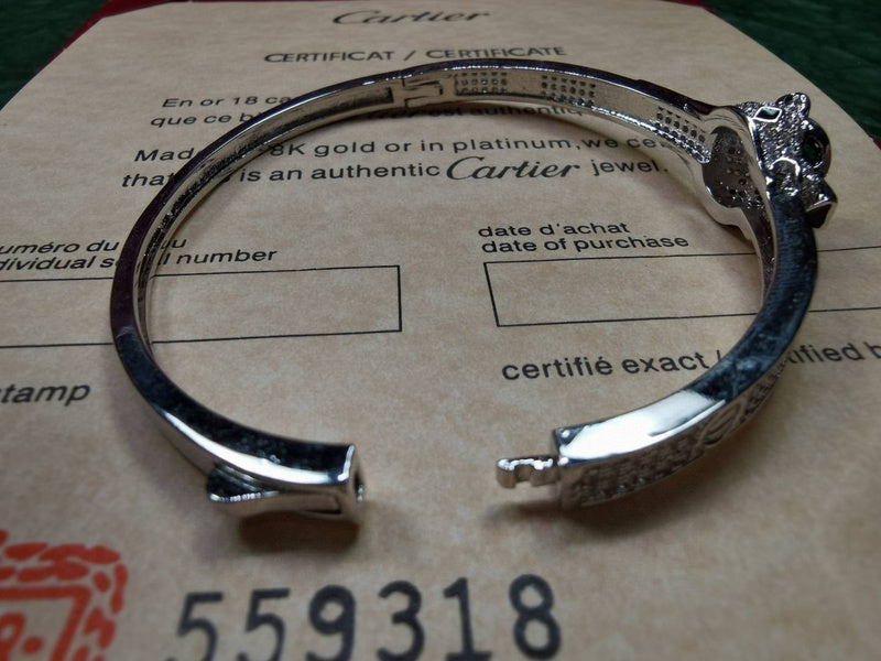 Front view of Cartier unisex jewelry piece