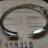 Front view of Cartier unisex jewelry piece