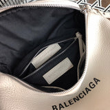 Side profile of everyday-luxe signature women's handbag – women's luxury accessory