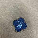Back view of Louis Vuitton luxury clothing with monogram-inspired silhouette