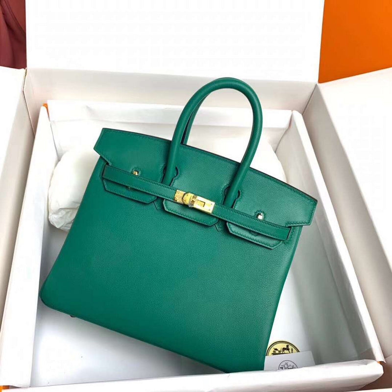 Side view of tailored structured handbag
