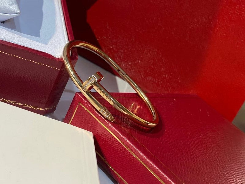 Close-up detail view of Cartier unisex jewelry piece