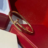 Close-up detail view of Cartier unisex jewelry piece
