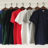 Back view of Lacoste luxury clothing with signature branding