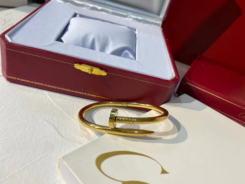 Side view of Cartier unisex jewelry piece