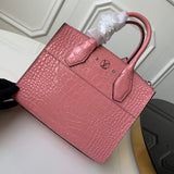 Handle and strap detail of modern elevated women's handbag – women's designer-style accessory