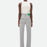Close-up of Bottega Veneta pants hardware and fine stitching