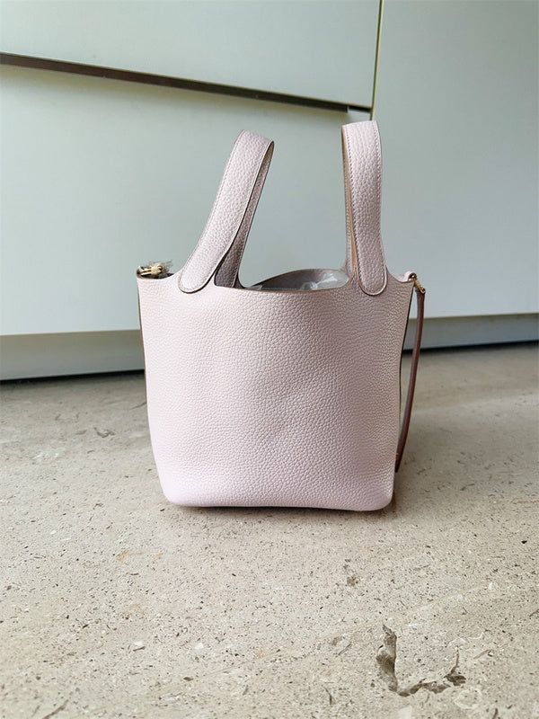  Structured crossbody bag carried on shoulder 10