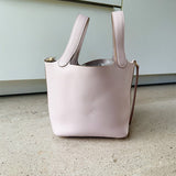  Structured crossbody bag carried on shoulder 10