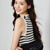 Back view of refined chic women's handbag – women's designer-style accessory