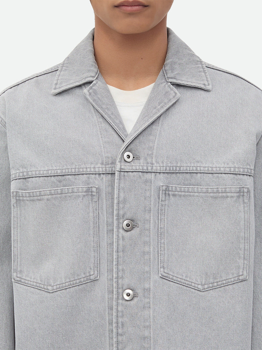Close-up of Bottega Veneta blouses hardware and fine stitching