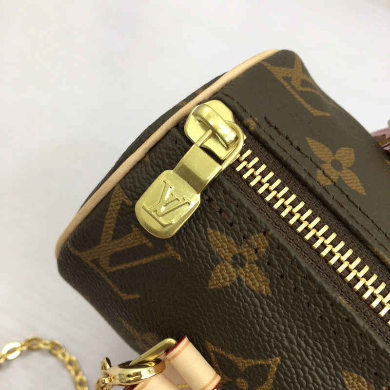 Handle and strap detail of polished signature women's handbag – women's luxury accessory