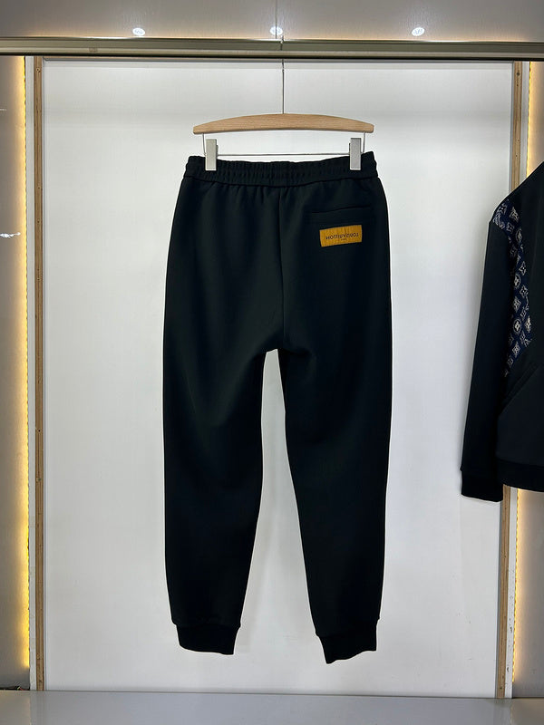 Close-up detail shot of Louis Vuitton luxury clothing with runway-inspired design