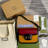 Front view of elevated structured women's handbag – women's statement bag