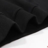 Close-up detail shot of Rhude luxury clothing with signature branding