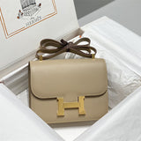Side view of streamlined structured handbag