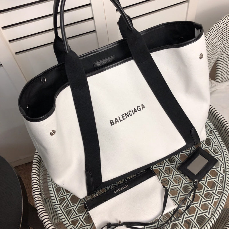 Styled lifestyle shot of modern statement women's handbag – women's luxury handbag