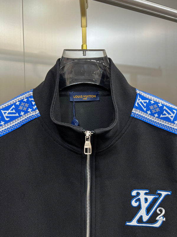 Close-up detail shot of Louis Vuitton luxury clothing with runway-inspired design