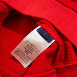 Side profile of Louis Vuitton luxury clothing with logo-detail design
