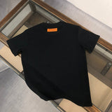 Side profile of Louis Vuitton cotton t-shirt with label-forward styling