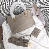 Top view of polished classic women's handbag – women's luxury accessory
