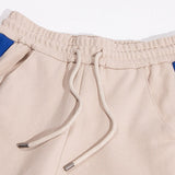 Close-up detail shot of Gucci luxury clothing with monogram-inspired silhouette