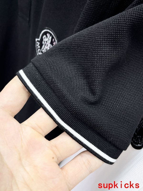 Flat lay presentation of Moncler luxury clothing with logo-detail design