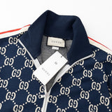 Flat lay presentation of Gucci luxury clothing with logo-detail design