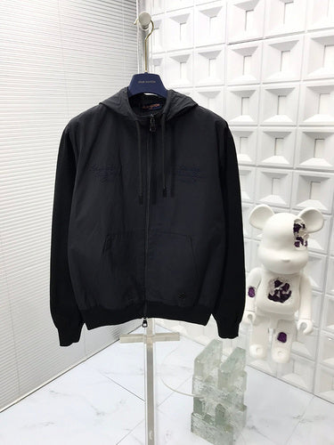 Full styled look of Louis Vuitton luxury clothing with signature branding