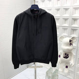 Full styled look of Louis Vuitton luxury clothing with signature branding