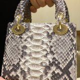 Front view of polished sleek women's handbag – women's premium purse