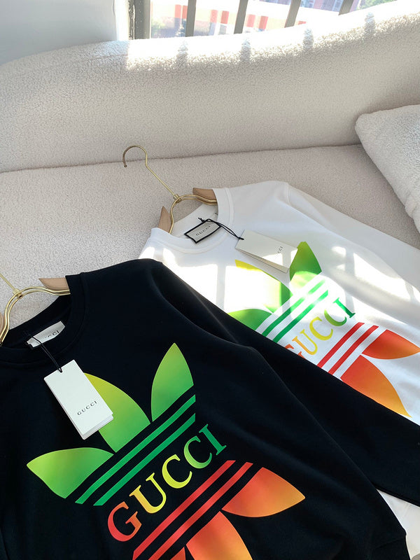 Close-up detail shot of Gucci luxury clothing with logo-detail design