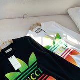 Close-up detail shot of Gucci luxury clothing with logo-detail design
