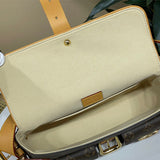  polished top-handle bag styled with outfit