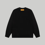 Close-up detail shot of Louis Vuitton luxury clothing with relaxed-fit cut